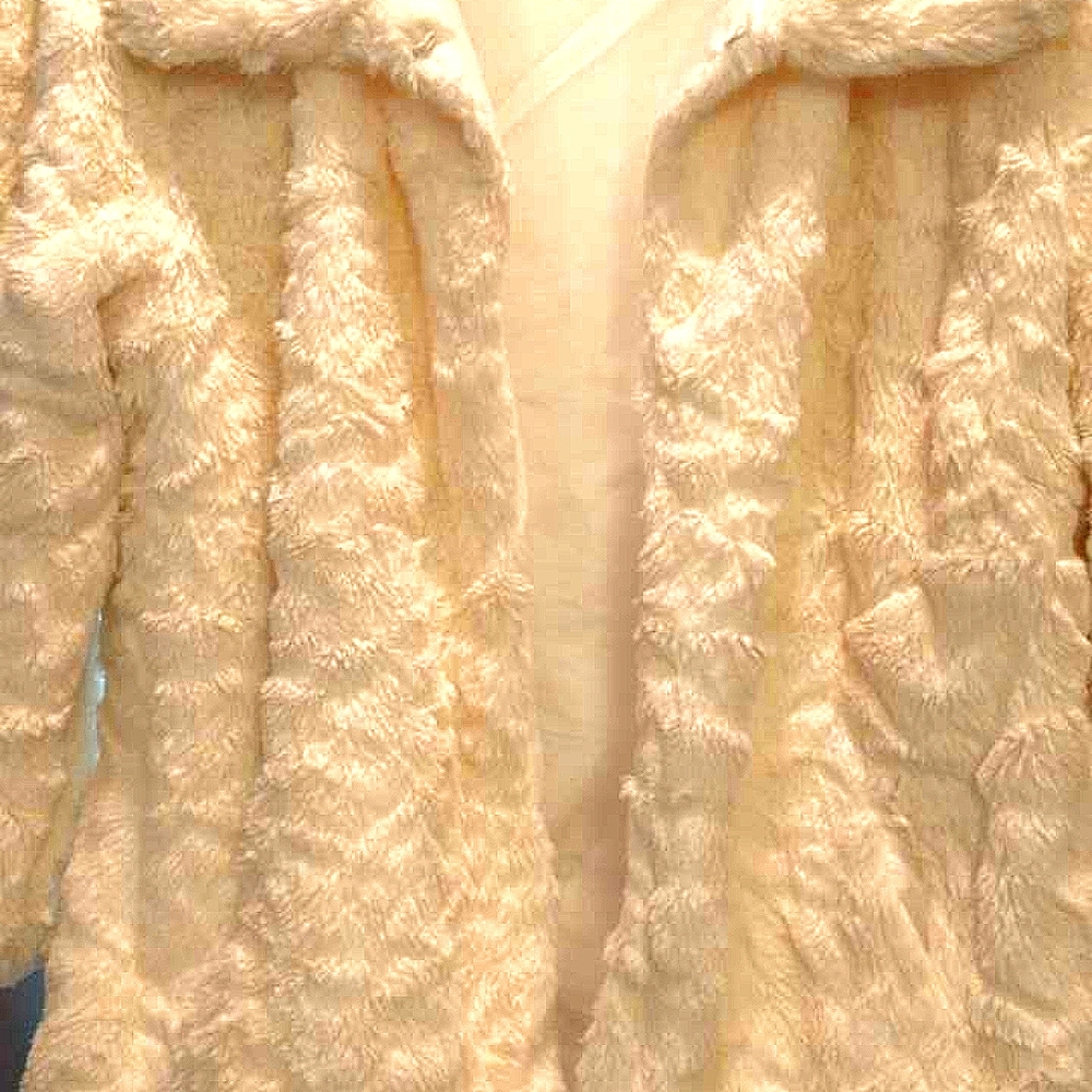 BEBE SOFT  AND FUZZY COAT ..